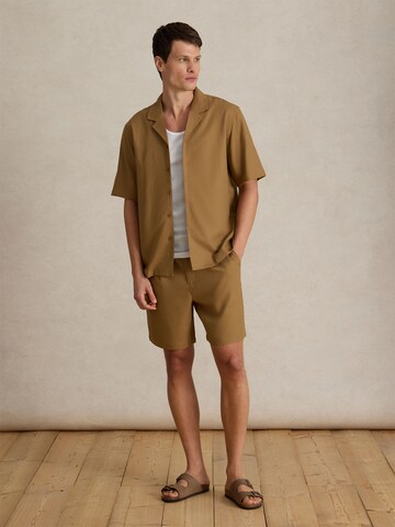 DAN FOX APPAREL Regular Veckad byxa 'Alan' i brun