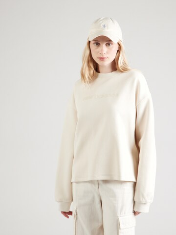 Sweat-shirt new balance en beige : devant