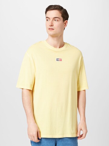 T-Shirt Tommy Jeans en jaune : devant