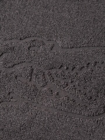 LACOSTE Handtuch 'LLACOSTE'‌‌‌‌‌‌‌‌‌ in Schwarz