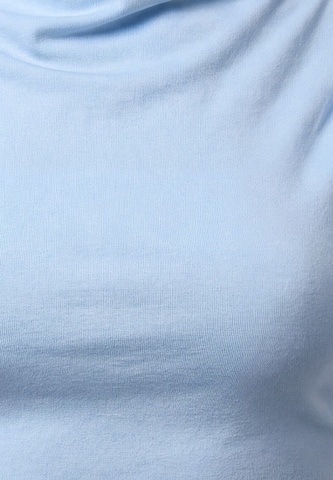 faina - Camiseta en azul