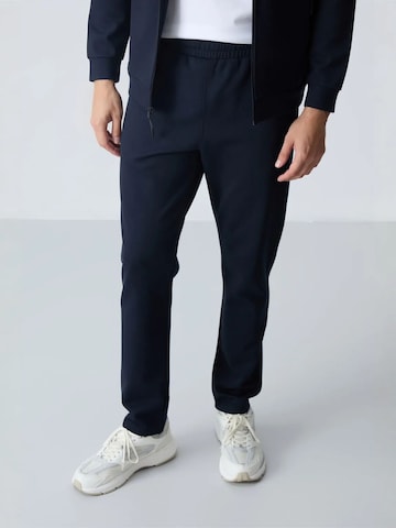 Tommy Life Trainingspak in Blauw