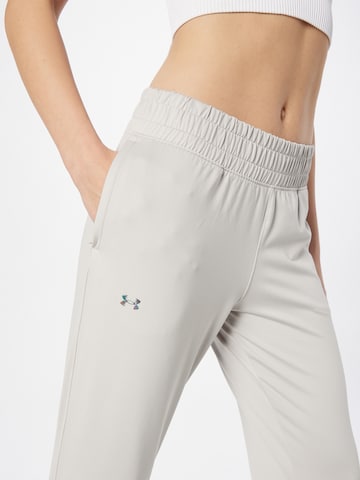 UNDER ARMOUR Zúžený Sportovní kalhoty – šedá