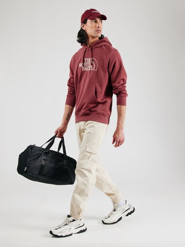 Felpa 'DREW PEAK' di THE NORTH FACE in rosso