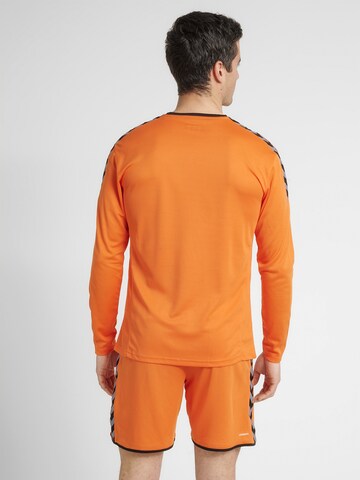 Hummel - Camiseta funcional en naranja