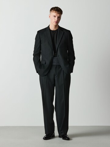 Loosefit Pantaloni con piega frontale di Next in nero