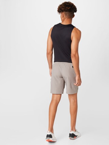 UNDER ARMOUR Regular Workout Pants in Grey