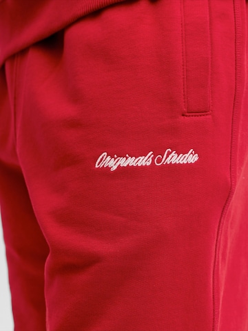 JACK & JONES Regularen Hlače 'JPSTKARL NORREBRO' | rdeča barva