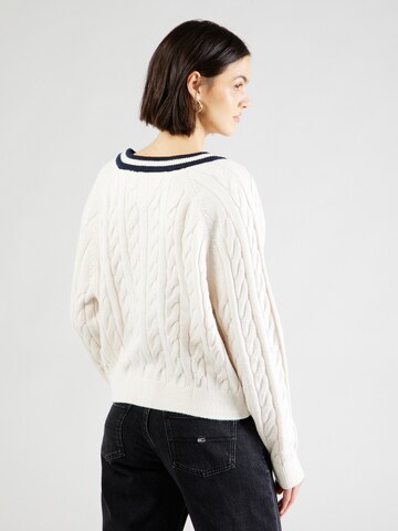 Pull-over Tommy Jeans en blanc