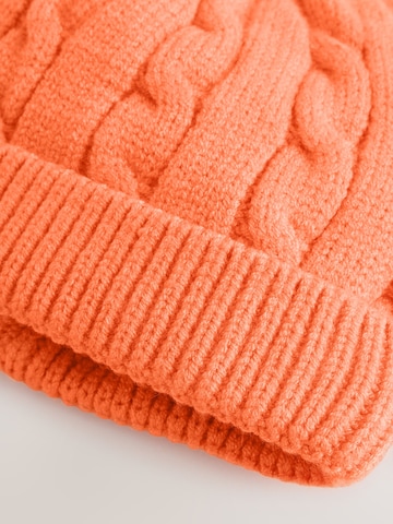 Next - Gorra en naranja