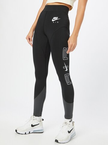 Skinny Leggings de la Nike Sportswear pe negru: față