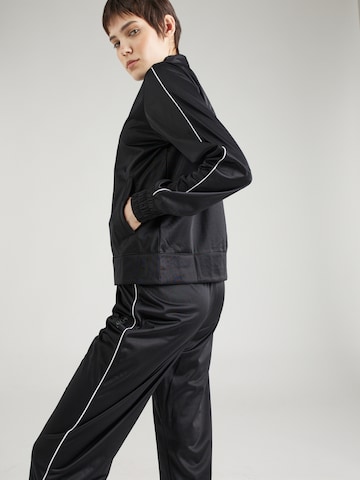 Champion Authentic Athletic Apparel Tracksuit in Black