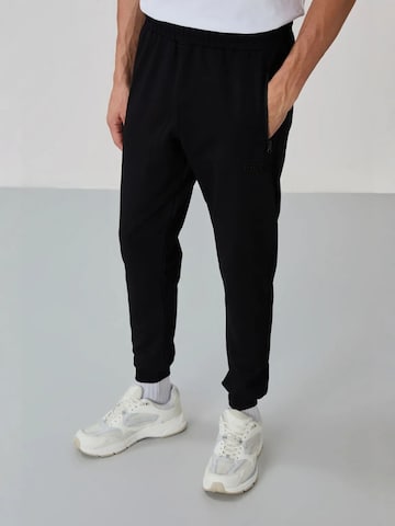 Tommy Life Trainingspak in Grijs