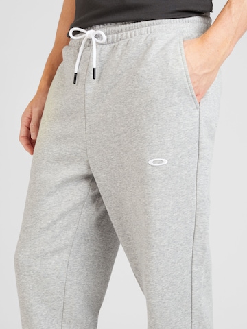 OAKLEY Tapered Sports trousers 'RELAX 2.0' in Grey