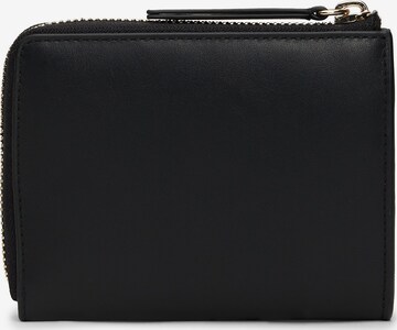 Porte-monnaies TOMMY HILFIGER en noir