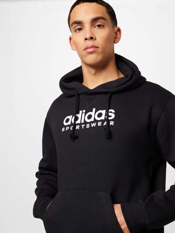 ADIDAS SPORTSWEAR Urheilullinen collegepaita värissä musta