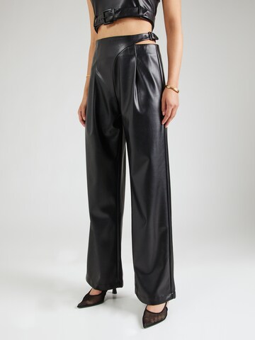 Hoermanseder Loose fit Pleat-front trousers in Black: front