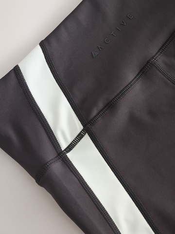 Next Skinny Funkcionalne hlače 'Active Power' | siva barva