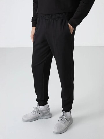 Tuta da jogging di Tommy Life in nero