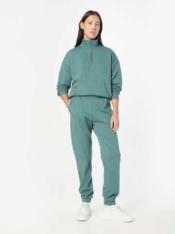 Athlecia Tapered Sportbroek 'Cinzia' in Groen