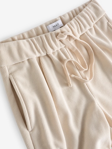 Wide leg Pantaloni di Next in beige