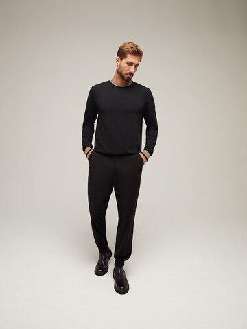 Coupe slim Pantalon chino 'Fabian' ABOUT YOU x Kevin Trapp en noir