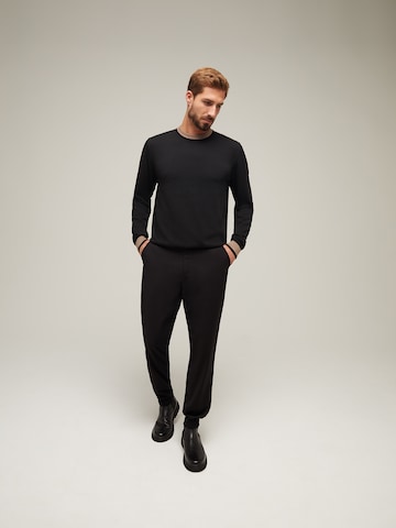 ABOUT YOU x Kevin Trapp Slimfit Chino 'Fabian' in Zwart