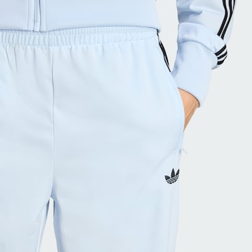 regular Pantaloni 'Firebird' di ADIDAS ORIGINALS in blu
