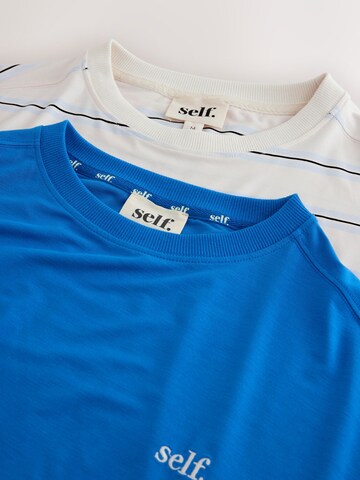 self. Shirts i blå