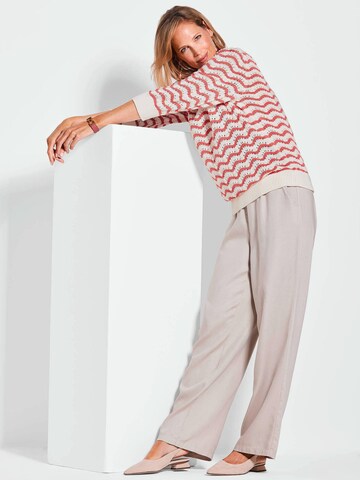 Goldner Pullover in Beige
