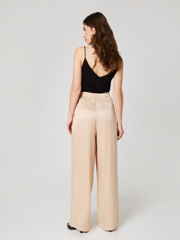 Guido Maria Kretschmer Women Wide leg Pants in Beige