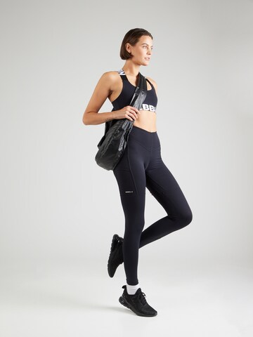 Skinny Pantalon de sport NEBBIA en noir