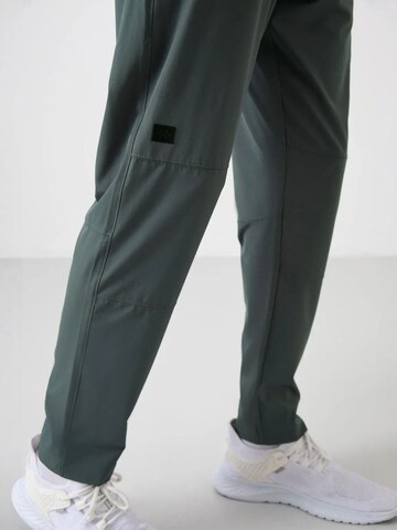 Pantalon de sport 'Jogginghose' Tommy Life en vert