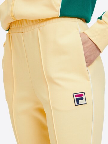 FILA Flared Pants 'LAIBEN' in Yellow