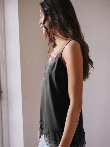 Next - Top en negro