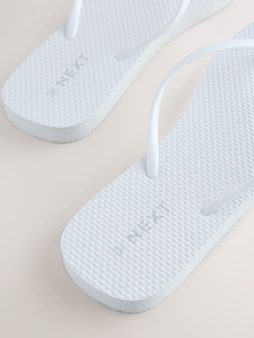 Tongs Next en blanc