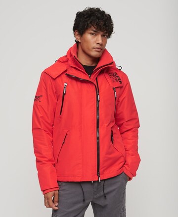 Veste mi-saison Superdry en rouge : devant