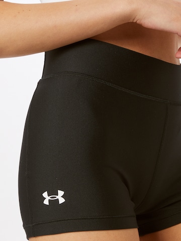 UNDER ARMOUR Workout Pants in Black