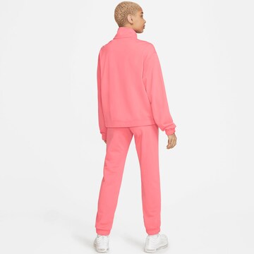 Nike Sportswear Tracksuit 'Essential' in Pink