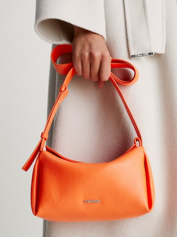 Calvin Klein Crossbody Bag in Orange