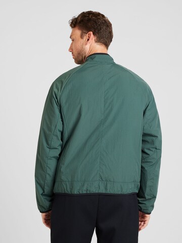 Veste mi-saison Nike Sportswear en vert