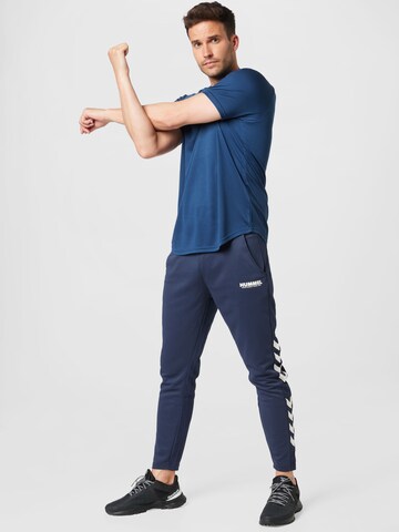 Hummel Tapered Sportbroek 'Legacy' in Blauw