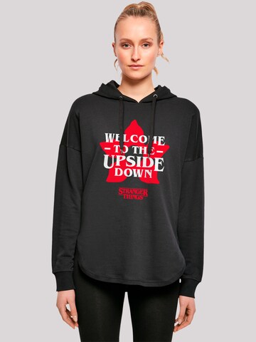 F4NT4STIC Sweatshirt 'Stranger Things Upside Down Dreams Netflix TV Series' in Zwart: voorkant