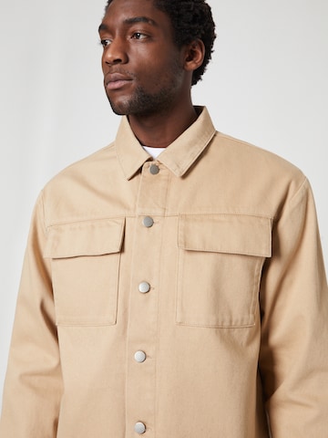 ABOUT YOU x Louis Darcis Between-Season Jacket in Beige