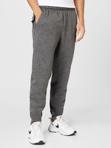 NIKE Tapered Workout Pants in Grey: front