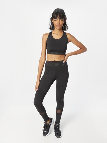 Top de la Plein Sport pe negru