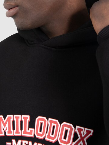 Sweat-shirt 'Exclusive Member' Smilodox en noir