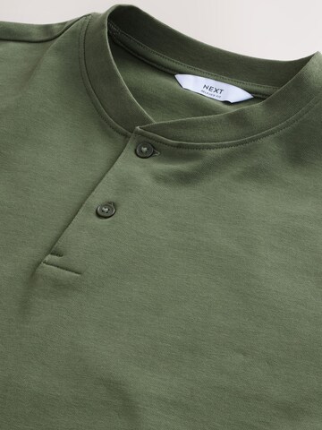 Tricou de la Next pe verde