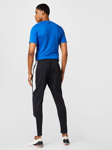 UNDER ARMOUR Tapered Workout Pants in Black