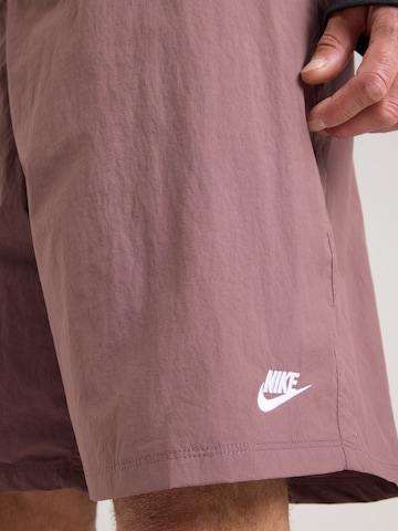 Nike Sportswear - Loosefit Calças 'CLUB' em vermelho